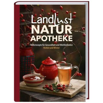 Buchcover der "Landlust Naturapotheke" zeigt eine rote Teekanne, eine Tasse Tee, Hagebuttenzweige und den Untertitel "Naturrezepte für Gesundheit und Wohlbefinden, Herbst und Winter" vor herbstlichem Hintergrund.